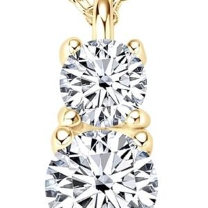 Moissanite trilogy necklace with three graduated stones in gold plated silver